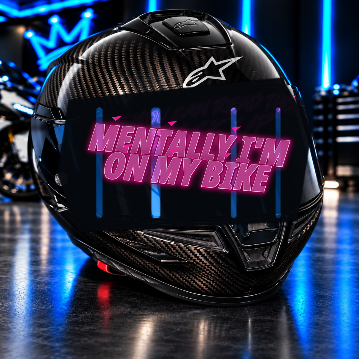Mentally I’m On My Bike Decal on carbon fiber motorcycle helmet in blue neon garage