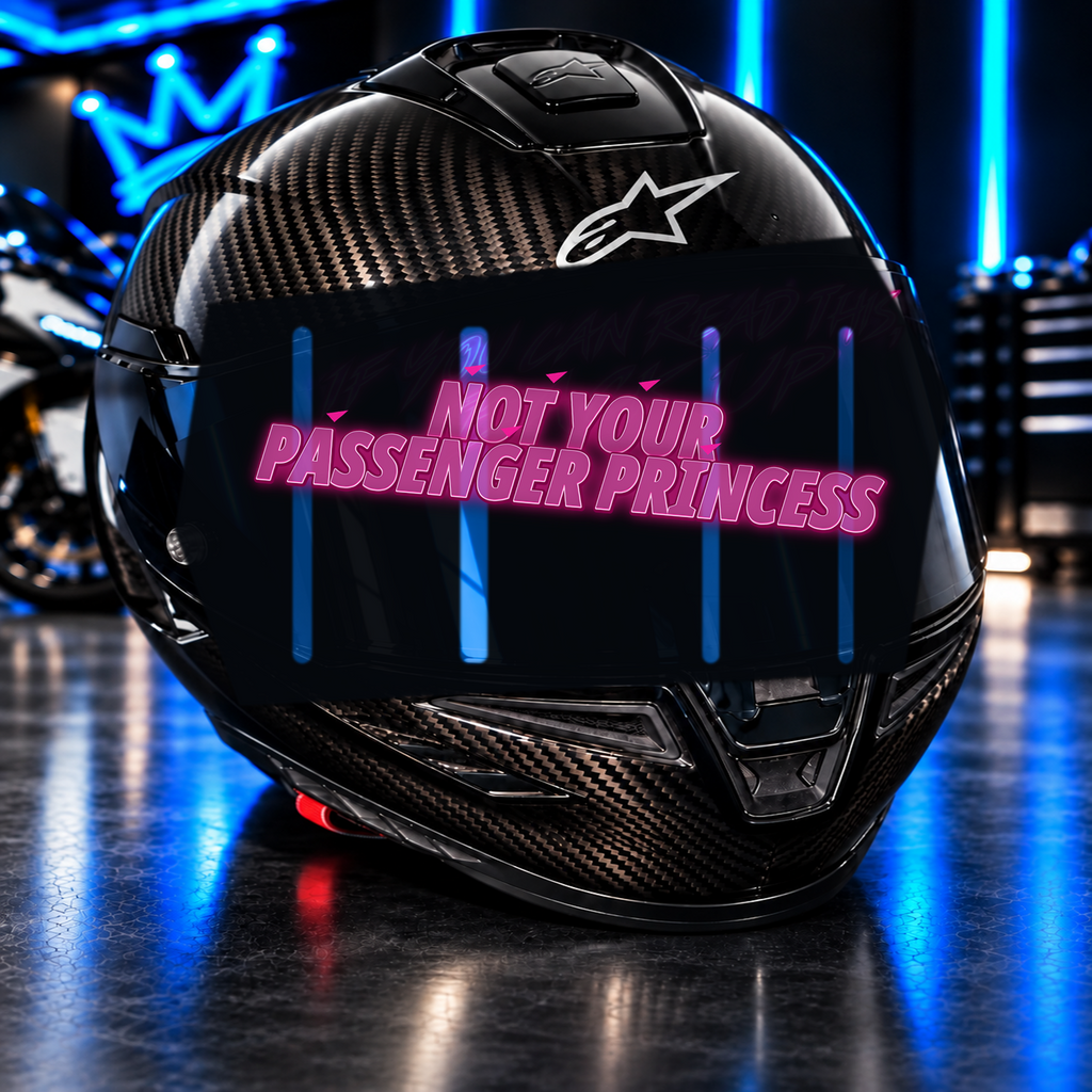 Not Your Passenger Princess Decal on carbon fiber motorcycle helmet in blue neon garage