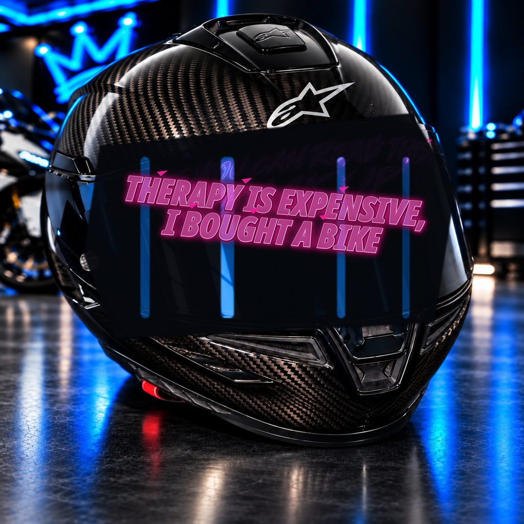 Therapy Is Expensive, I Bought A Bike Decal on carbon fiber motorcycle helmet in blue neon garage